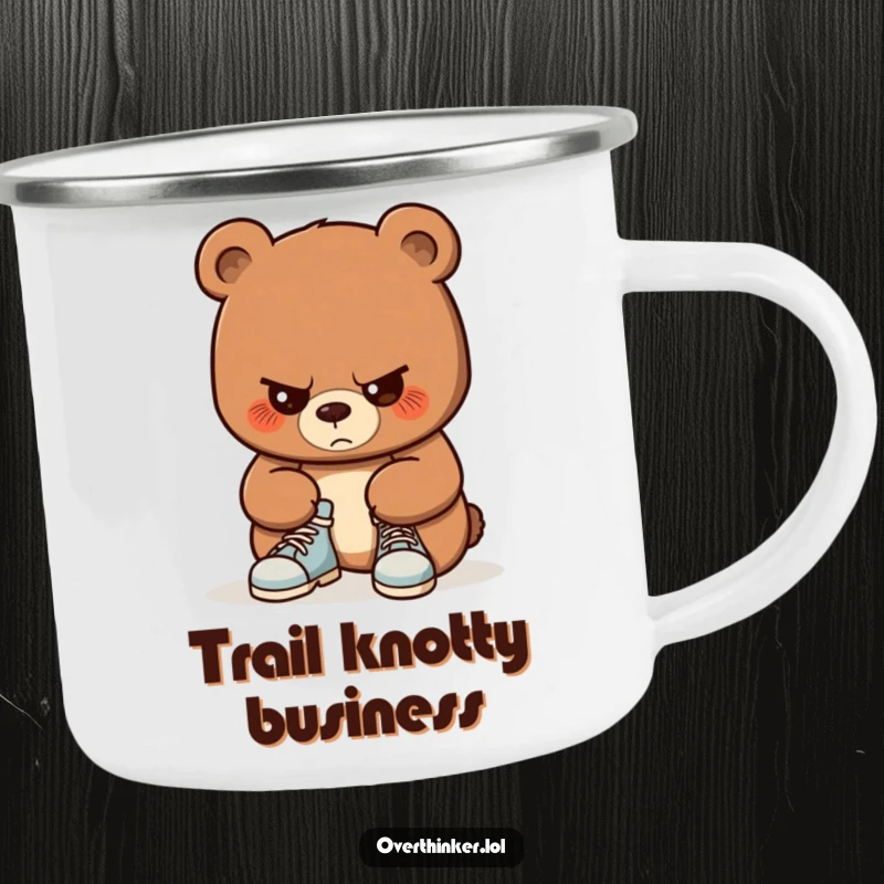 Funny camping mug featuring a bear with intense concentration on tying its shoelaces. Humorous and durable for outdoor enthusiasts.