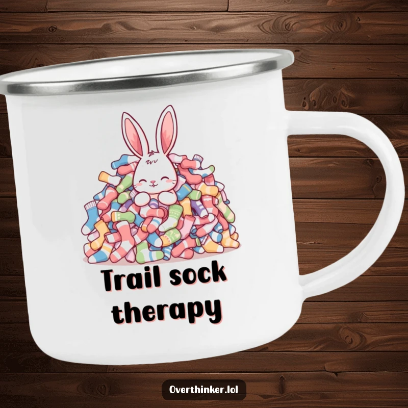 Funny rabbit camping mug depicting a rabbit surrounded by a mountain of mismatched socks, ideal for outdoor enthusiasts who love humor.