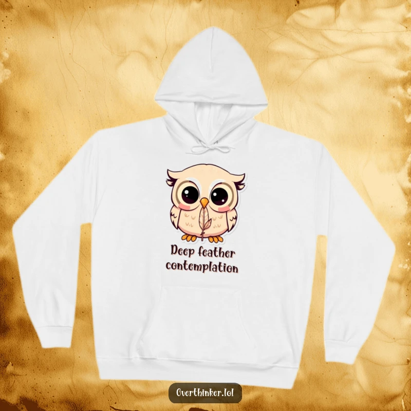 Funny Kawaii owl hoodie featuring a cute owl staring intently at a small feather, perfect for cozy and humorous wear.