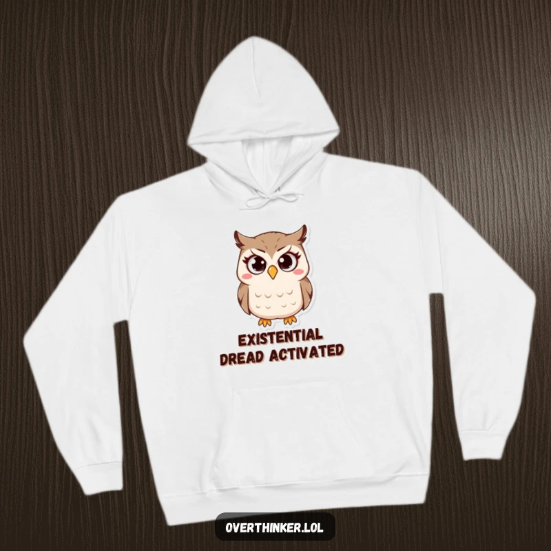 Funny Owl Hoodie featuring a small owl character with wide, questioning eyes and a furrowed brow, conveying a sense of wonder. Cozy and funny.