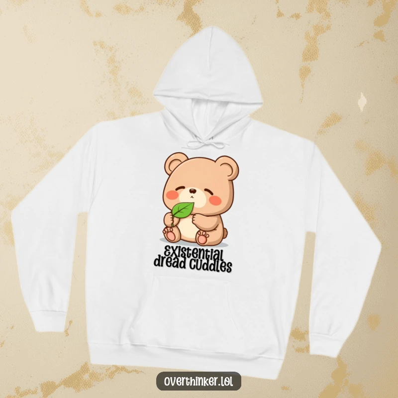 Funny Kawaii bear hoodie, a cozy character deeply engrossed in observing a single floating leaf, showcasing thoughtful humor.