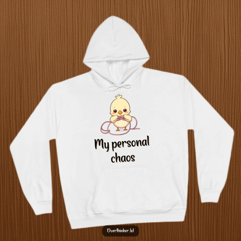 Funny Bird Hoodie featuring a small bird character entangled in a messy knot of yarn. Comfortable and humorously relatable.