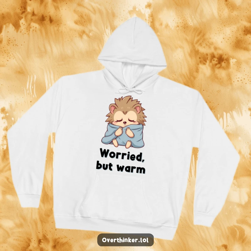 Funny hoodie showcasing a hedgehog swaddled in blankets, lost in deep, anxious contemplation, a relatable mood.