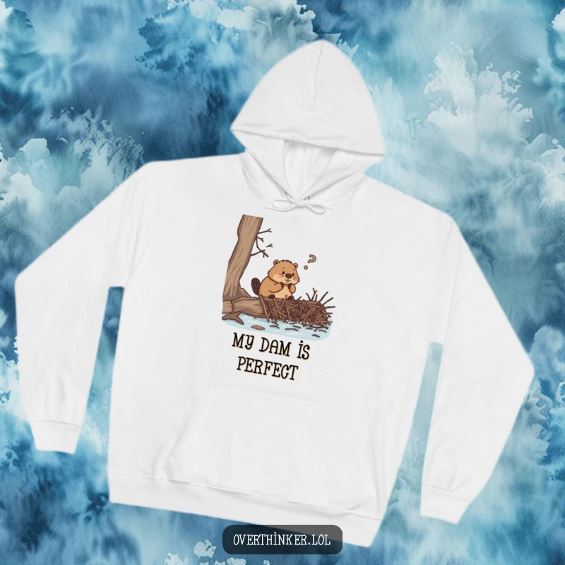 Funny hoodie, an overthinking beaver surrounded by numerous tiny twigs while attempting to build a dam, conveying humorous struggle.