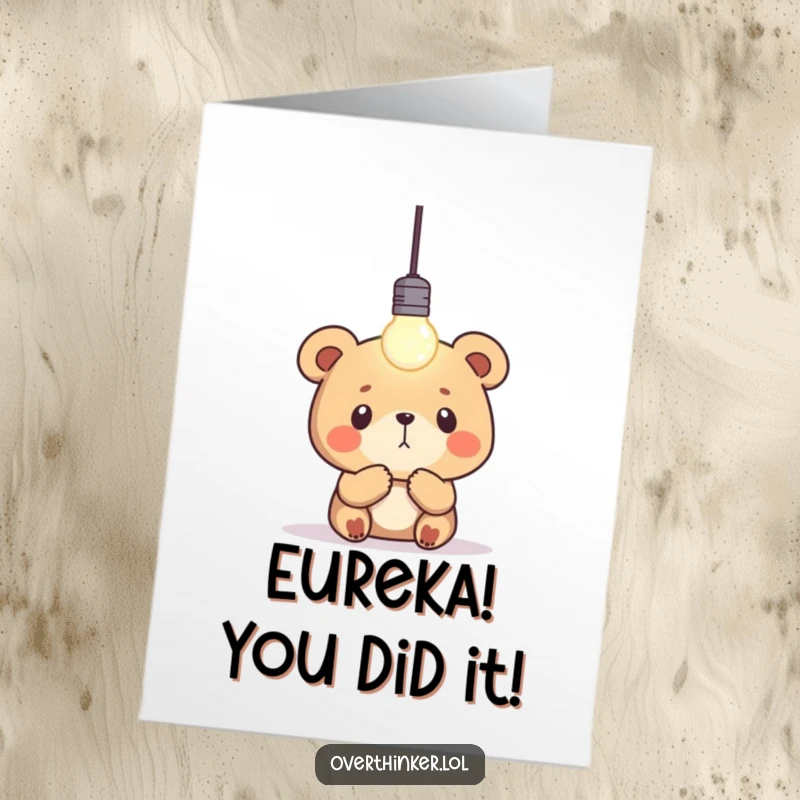 Funny Free Printable Congrats Card: Bear character with a glowing lightbulb above, signifying a great idea. Downloadable art.