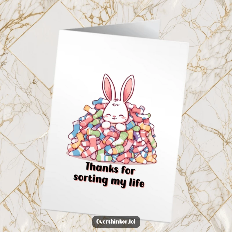 Funny Free Printable Thank You Card: Rabbit looking pleased amidst sorted socks, a thank you message nearby. Downloadable art.