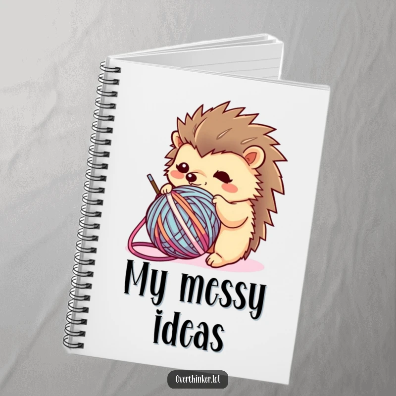 Funny Kawaii hedgehog notebook with a flustered character caught in yarn, ideal for jotting down ideas with a humorous and relatable theme.