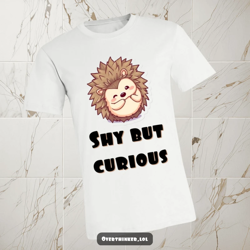Funny Kawaii hedgehog t-shirt, a cute character curling into a ball then peeking out inquisitively with a shy expression.