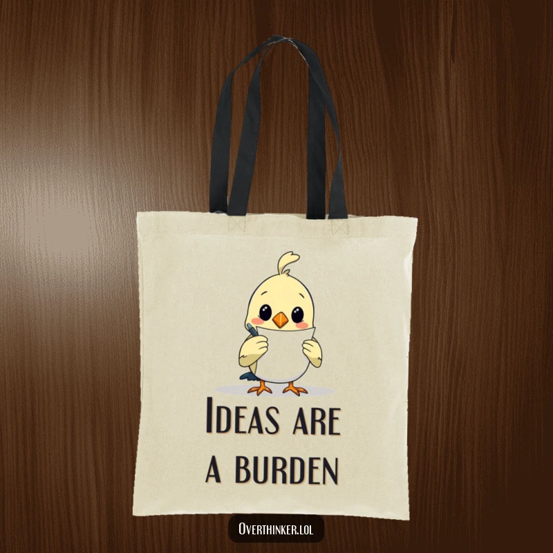 Funny tote bag with an overthinking bird holding a pen, staring at a blank paper, symbolizing creative thought and writer's block.