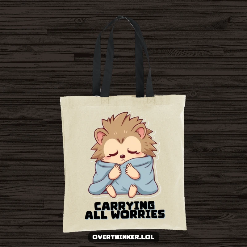 Funny tote bag featuring a hedgehog wrapped in blankets, symbolizing anxious contemplation, great for carrying daily items.